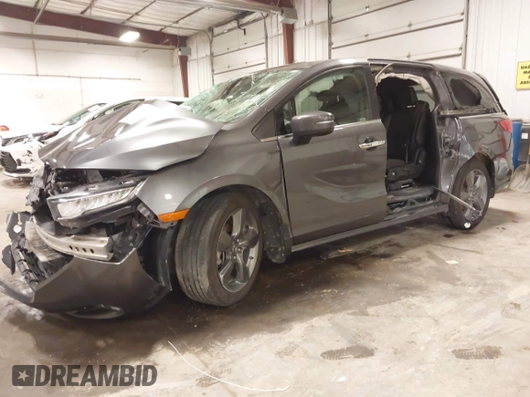 2021 Honda Odyssey Touring with VIN 5FNRL6H82MB025923, listed as a IAAI auction lot 42104290 with 61,178 mi miles and . Bid and sale history available at DreamBid. Image 22.