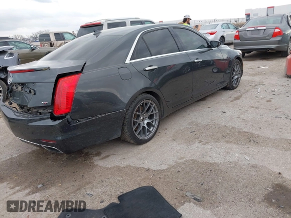 2014 Cadillac CTS Vsport Premium RWD z VIN 1G6AV5S8XE0175517, wystawiony jako IAAI lot #41126885 z przebiegiem 140 667 mil mil oraz . Historia ofert i sprzedaży dostępna na DreamBid. Obrazek 4.