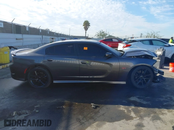 2019 Dodge Charger Scat Pack with VIN 2C3CDXGJ7KH588717, listed as a IAAI auction lot 41694673 with Not Provided miles and . Bid and sale history available at DreamBid. Image 12.