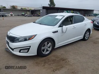 2014 Kia Optima LX with VIN 5XXGM4A72EG260072, listed as a IAAI auction lot 42109844 with 167,910 mi miles and . Bid and sale history available at carsss.com. Image 2.