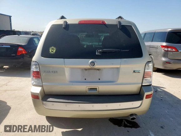 2010 Mercury Mariner with VIN 4M2CN8BG0AKJ09078, listed as a Copart auction lot 52863705 with 98,350 mi miles and Salvage title. Bid and sale history available at DreamBid. Image 6.