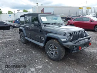 2019 Jeep Wrangler Unlimited Sport S с VIN 1C4HJXDG6KW571640, выставлен на аукционе IAAI как лот 42299078 с пробегом 51 928 миль миль и . История ставок и продаж доступна на DreamBid. Изображение 1.