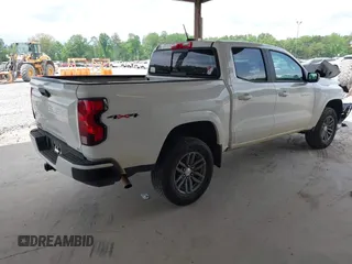 2023 Chevrolet Colorado 4WD LT z VIN 1GCPTCEK0P1221796, wystawiony jako IAAI lot #42076600 z przebiegiem 23 262 mil mil oraz . Historia ofert i sprzedaży dostępna na DreamBid. Obrazek 4.