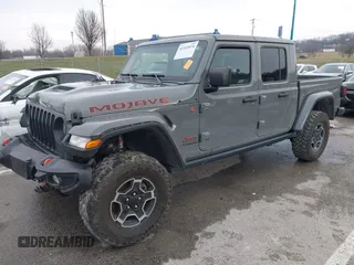 2022 Jeep Gladiator Mojave z VIN 1C6JJTEG8NL130971, wystawiony jako IAAI lot #41163074 z przebiegiem 47 142 mil mil oraz . Historia ofert i sprzedaży dostępna na DreamBid. Obrazek 21.