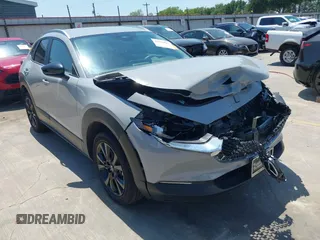 2025 Mazda CX-30 S Select Sport with VIN 3MVDMBBM4SM786711, listed as a IAAI auction lot 42423822 with 3,406 mi miles and . Bid and sale history available at DreamBid. Image 1.