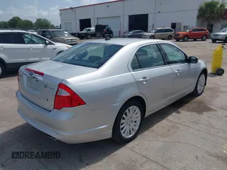 2011 Ford Fusion Hybrid with VIN 3FADP0L38BR249996, listed as a IAAI auction lot 42452194 with 111,316 mi miles and . Bid and sale history available at DreamBid. Image 4.