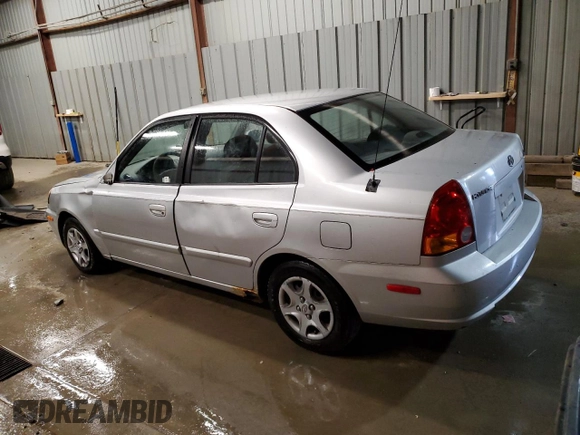 2004 Hyundai Accent GL with VIN KMHCG45C04U544804, listed as a Copart auction lot 72912984 with 121,178 mi miles and Salvage Title. Bid and sale history available at carsss.com. Image 2.