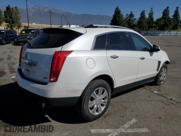2015 Cadillac SRX Luxury Collection with VIN 3GYFNBE34FS555989, listed as a Copart auction lot 52765485 with 93,988 mi miles and Salvage Title. Bid and sale history available at DreamBid. Image 3.