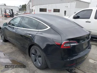 2019 Tesla Model 3 Mid Range with VIN 5YJ3E1EA3KF313425, listed as a IAAI auction lot 41806388 with 110,767 mi miles and . Bid and sale history available at carsss.com. Image 3.