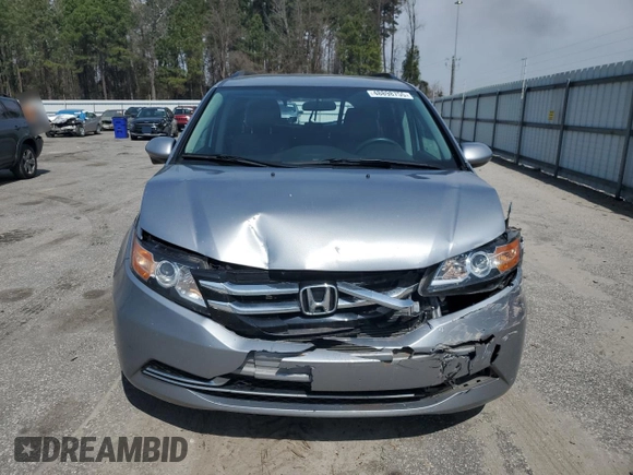 2016 Honda Odyssey SE with VIN 5FNRL5H36GB144433, listed as a Copart auction lot 48898755 with 192,442 mi miles and Salvage Title. Bid and sale history available at DreamBid. Image 5.