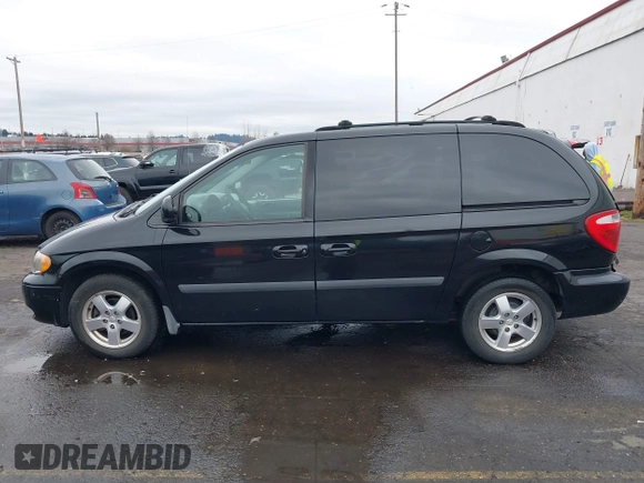 2007 Dodge Caravan SXT with VIN 1D4GP45R87B161237, listed as a IAAI auction lot 41594127 with 154,508 mi miles and . Bid and sale history available at DreamBid. Image 14.