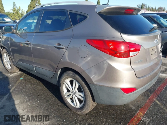 2013 Hyundai Tucson GLS with VIN KM8JU3AC0DU705782, listed as a IAAI auction lot 41804846 with 81,260 mi miles. Bid and sale history available at carsss.com. Image 3.