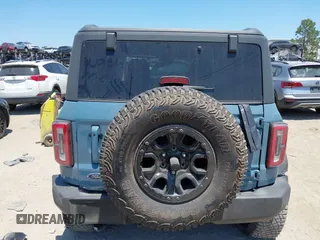 2021 Ford Bronco z VIN 1FMDE5CP5MLA98340, wystawiony jako IAAI lot #42064998 z przebiegiem 38 569 mil mil oraz . Historia ofert i sprzedaży dostępna na DreamBid. Obrazek 17.