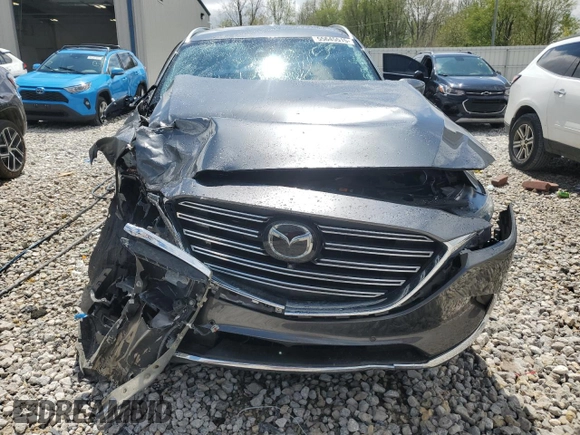 2021 Mazda CX-9 Grand Touring with VIN JM3TCBDY7M0508897, listed as a Copart auction lot 55645515 with 62,917 mi miles and Salvage title. Bid and sale history available at DreamBid. Image 5.
