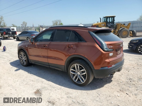 2019 Cadillac XT4 AWD Sport with VIN 1GYFZFR42KF136567, listed as a Copart auction lot 52018445 with 99,944 mi miles and Salvage title. Bid and sale history available at DreamBid. Image 2.