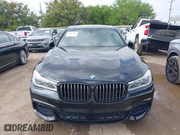 2017 BMW 7 Series 750i with VIN WBA7F0C55HGM21460, listed as a IAAI auction lot 41934198 with 58,206 mi miles and . Bid and sale history available at DreamBid. Image 6.