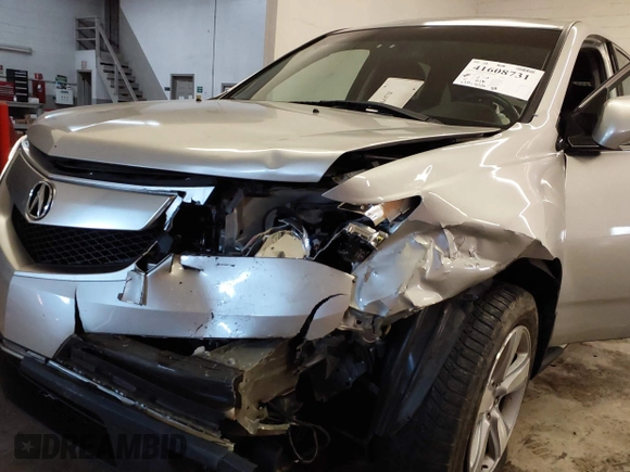 2012 Acura MDX with VIN 2HNYD2H24CH513965, listed as a IAAI auction lot 41608731 with 120,456 mi miles and . Bid and sale history available at DreamBid. Image 6.