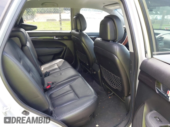 2013 Kia Sorento LX with VIN 5XYKT4A20DG360991, listed as a IAAI auction lot 42258999 with 129,278 mi miles and . Bid and sale history available at DreamBid. Image 8.