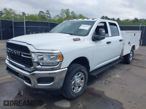 2024 Ram 2500 Tradesman with VIN 3C6UR5HJ1RG114588, listed as a IAAI auction lot 41923877 with 1,800 mi miles and . Bid and sale history available at DreamBid. Image 2.
