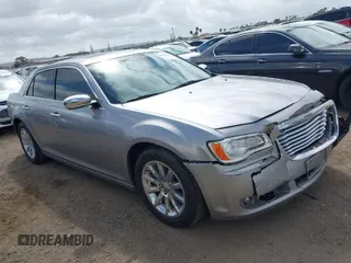 2013 Chrysler 300 with VIN 2C3CCAEG2DH731499, listed as a IAAI auction lot 41899647 with 80,041 mi miles. Bid and sale history available at carsss.com. Image 1.