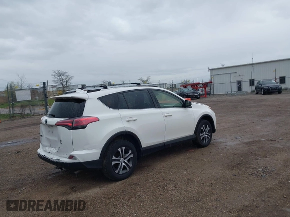 2018 Toyota RAV4 LE with VIN JTMBFREV8JJ722277, listed as a IAAI auction lot 42075684 with 203,458 mi miles and . Bid and sale history available at DreamBid. Image 4.