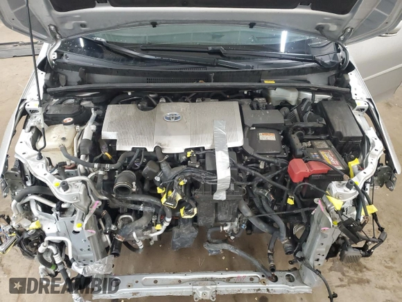 2017 Toyota Prius Plus z VIN JTDKARFP9H3034575, wystawiony jako Copart lot #57501125 z przebiegiem 82 647 mil mil oraz Szkoda całkowita • Salvage title. Historia ofert i sprzedaży dostępna na DreamBid. Obrazek 11.