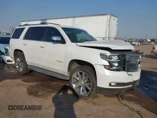 2016 Chevrolet Tahoe LTZ with VIN 1GNSCCKC1GR191417, listed as a IAAI auction lot 41499020 with 216,089 mi miles and . Bid and sale history available at DreamBid. Image 1.