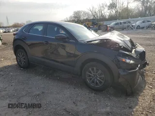 2020 Mazda CX-30 with VIN 3MVDMBBL7LM107409, listed as a Copart auction lot 77851014 with 102,182 mi miles and Non Repairable. Bid and sale history available at DreamBid. Image 4.