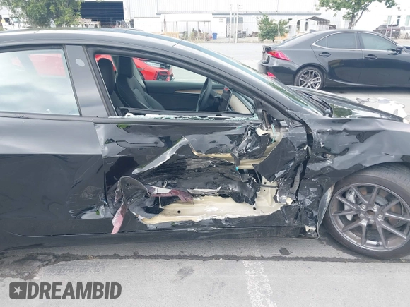 2023 Tesla Model 3 with VIN 5YJ3E1EA5PF647737, listed as a IAAI auction lot 42430145 with 20,525 mi miles and . Bid and sale history available at DreamBid. Image 6.