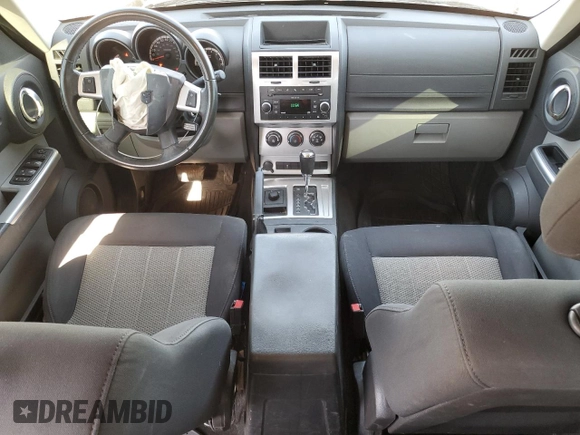 2010 Dodge Nitro SXT with VIN 1D4PU5GK1AW129356, listed as a Copart auction lot 53111155 with 158,818 mi miles and Salvage Title. Bid and sale history available at DreamBid. Image 8.