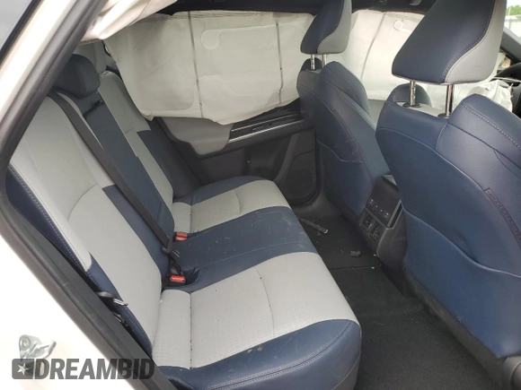 2023 Subaru Solterra Touring with VIN JTMABABA4PA003434, listed as a Copart auction lot 59837165 with 9,587 mi miles and Salvage title. Bid and sale history available at DreamBid. Image 11.