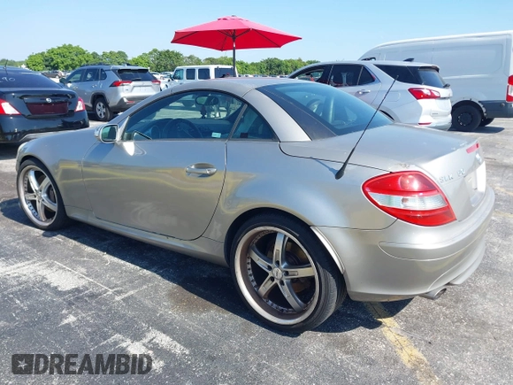 2005 Mercedes-Benz SLK 230/320 with VIN WDBWK56F85F032243, listed as a IAAI auction lot 42267834 with 128,289 mi miles and . Bid and sale history available at DreamBid. Image 3.