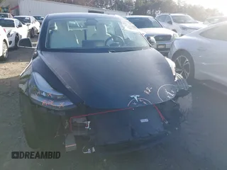 2019 Tesla Model 3 Mid Range z VIN 5YJ3E1EA4KF317872, wystawiony jako IAAI lot #41491269 z przebiegiem 90 772 mil mil oraz . Historia ofert i sprzedaży dostępna na DreamBid. Obrazek 6.