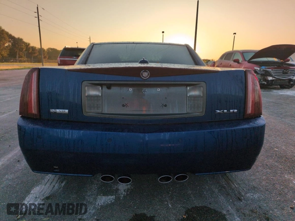 2004 Cadillac XLR z VIN 1G6YV34A945601993, wystawiony jako Copart lot #75136134 z przebiegiem Nie podano mil oraz Nie do naprawy. Historia ofert i sprzedaży dostępna na DreamBid. Obrazek 6.