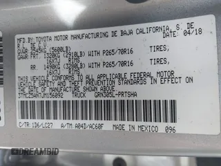 2018 Toyota Tacoma SR z VIN 3TMCZ5AN7JM156092, wystawiony jako IAAI lot #41642391 z przebiegiem 65 805 mil mil oraz . Historia ofert i sprzedaży dostępna na DreamBid. Obrazek 9.