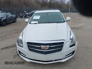 2017 Cadillac ATS AWD z VIN 1G6AG5RX4H0180112, wystawiony jako IAAI lot #41605661 z przebiegiem 142 931 mil mil oraz . Historia ofert i sprzedaży dostępna na DreamBid. Obrazek 13.