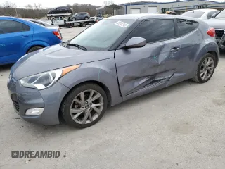 2017 Hyundai Veloster with VIN KMHTC6AD4HU310841, listed as a Copart auction lot 36048343 with 135,319 mi miles. Bid and sale history available at carsss.com. Image 1.
