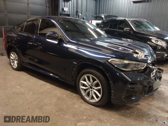 2022 BMW X6 M50i z VIN 5UXCY8C05N9J70601, wystawiony jako IAAI lot #42344397 z przebiegiem 49 085 mil mil oraz . Historia ofert i sprzedaży dostępna na DreamBid. Obrazek 1.