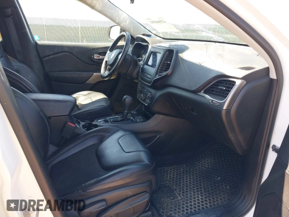 2019 Jeep Cherokee Latitude Plus with VIN 1C4PJMLB8KD112699, listed as a IAAI auction lot 42166892 with 128,396 mi miles and . Bid and sale history available at DreamBid. Image 5.