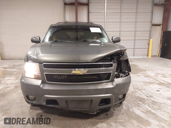 2011 Chevrolet Suburban LT with VIN 1GNSCJE0XBR180270, listed as a IAAI auction lot 41531193 with 202,493 mi miles. Bid and sale history available at carsss.com. Image 12.