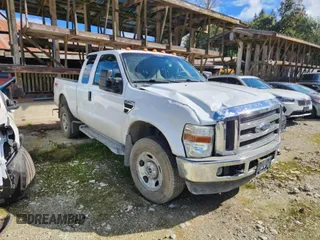 2009 Ford F-350 XL with VIN 1FTWX31579EA59709, listed as a Copart auction lot 69289714 with 231,511 mi miles and Salvage Title. Bid and sale history available at DreamBid. Image 4.