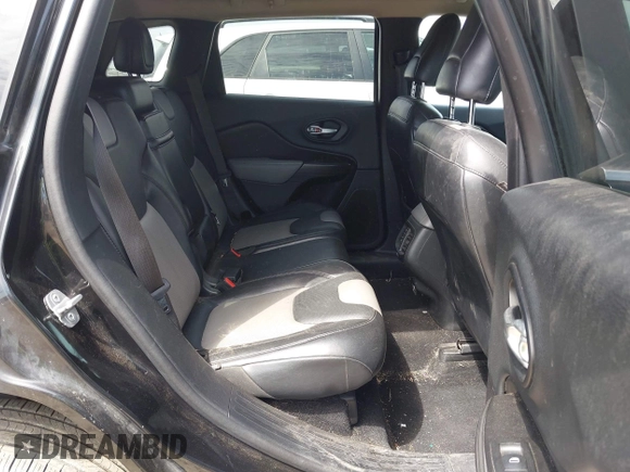 2014 Jeep Cherokee Limited with VIN 1C4PJLDB4EW256137, listed as a IAAI auction lot 42236043 with 145,517 mi miles and . Bid and sale history available at DreamBid. Image 8.