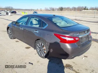 2016 Nissan Altima SV with VIN 1N4AL3AP3GC131740, listed as a IAAI auction lot 41630139 with 103,181 mi miles and . Bid and sale history available at DreamBid. Image 3.