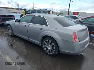 2013 Chrysler 300 with VIN 2C3CCABG3DH736120, listed as a IAAI auction lot 41765794 with 126,268 mi miles. Bid and sale history available at carsss.com. Image 3.