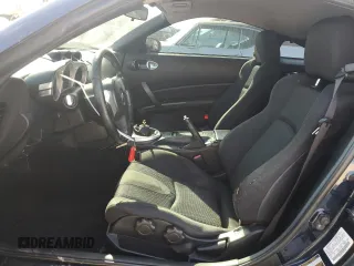 2007 Nissan 350Z with VIN JN1BZ34D27M501359, listed as a Copart auction lot 83953774 with 184,017 mi miles and Non Repairable. Bid and sale history available at DreamBid. Image 7.