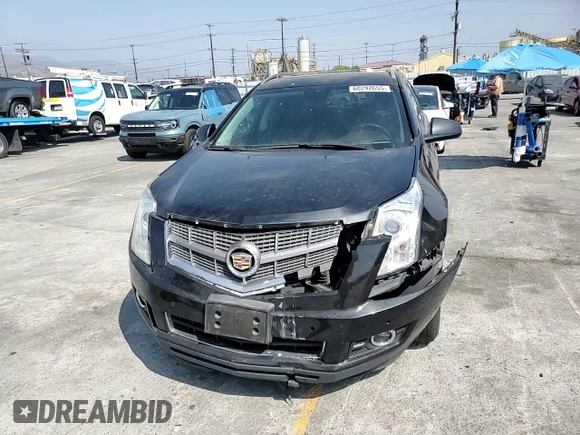 2012 Cadillac SRX Luxury Collection z VIN 3GYFNAE38CS638136, wystawiony jako Copart lot #60292655 z przebiegiem 124 569 mil mil oraz Szkoda całkowita • Salvage title. Historia ofert i sprzedaży dostępna na DreamBid. Obrazek 14.
