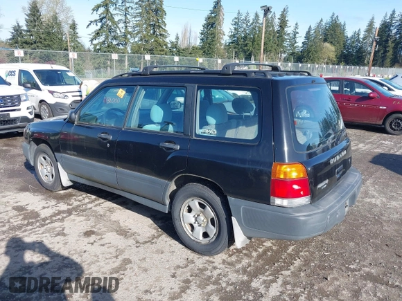 1999 Subaru Forester L with VIN JF1SF6351XH716957, listed as a IAAI auction lot 41969521 with 253,696 mi miles. Bid and sale history available at carsss.com. Image 3.