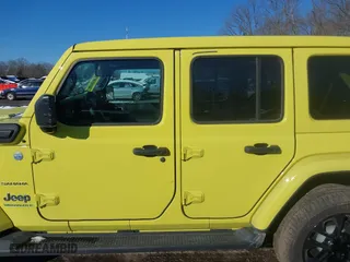 2023 Jeep Wrangler 4xe Sahara with VIN 1C4JJXP66PW580527, listed as a IAAI auction lot 41261127 with 15,100 mi miles. Bid and sale history available at carsss.com. Image 14.