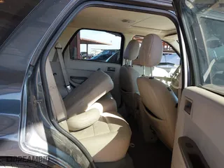 2008 Ford Escape Hybrid with VIN 1FMCU49HX8KB90001, listed as a IAAI auction lot 41558762 with 200,677 mi miles. Bid and sale history available at carsss.com. Image 8.