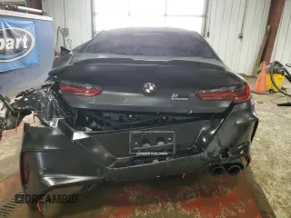 2025 BMW M8 Competition with VIN WBSGV0C04SCS21820, listed as a Copart auction lot 73384474 with 3,457 mi miles and Salvage Title. Bid and sale history available at carsss.com. Image 6.